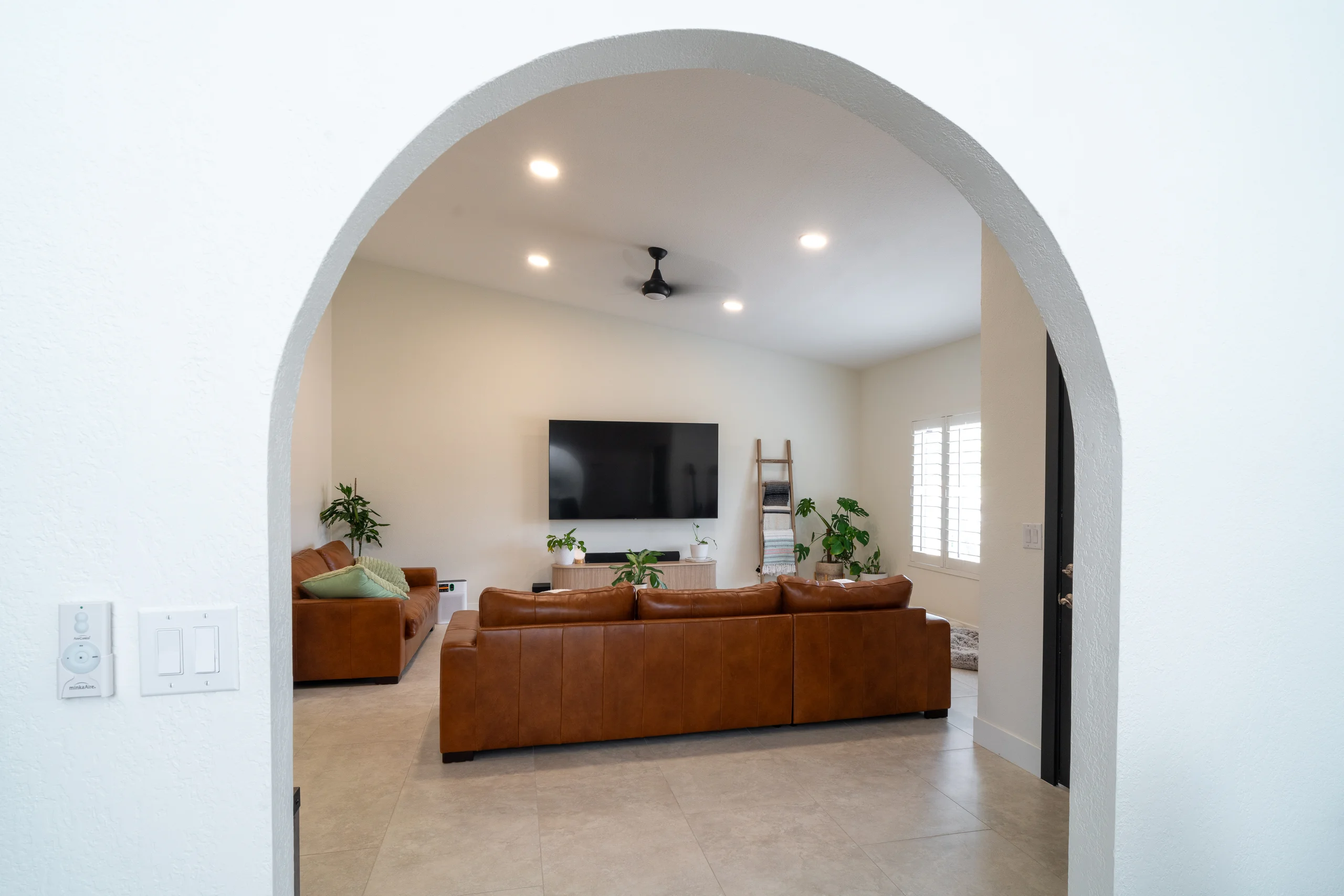 Living room with seating and modern fireplace
