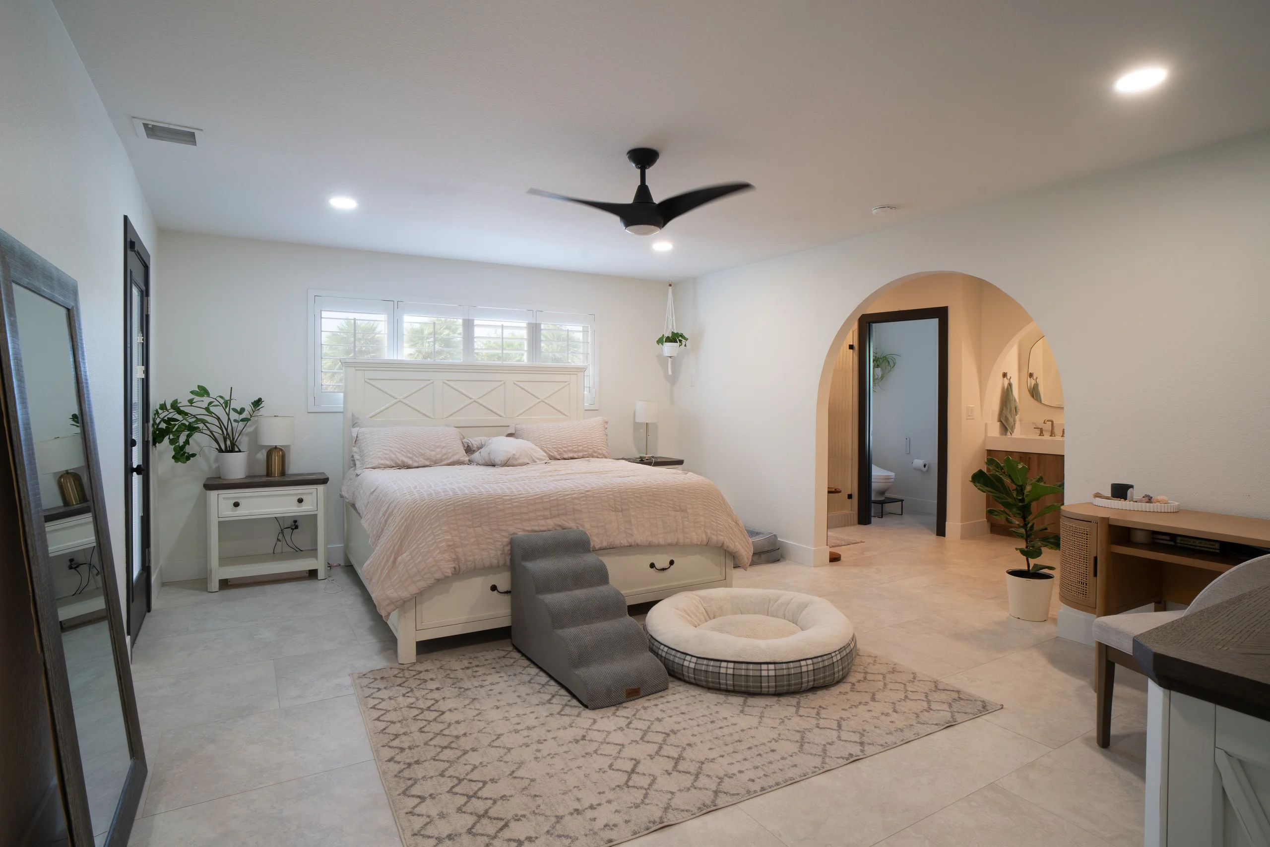 Primary bedroom with modern furnishings