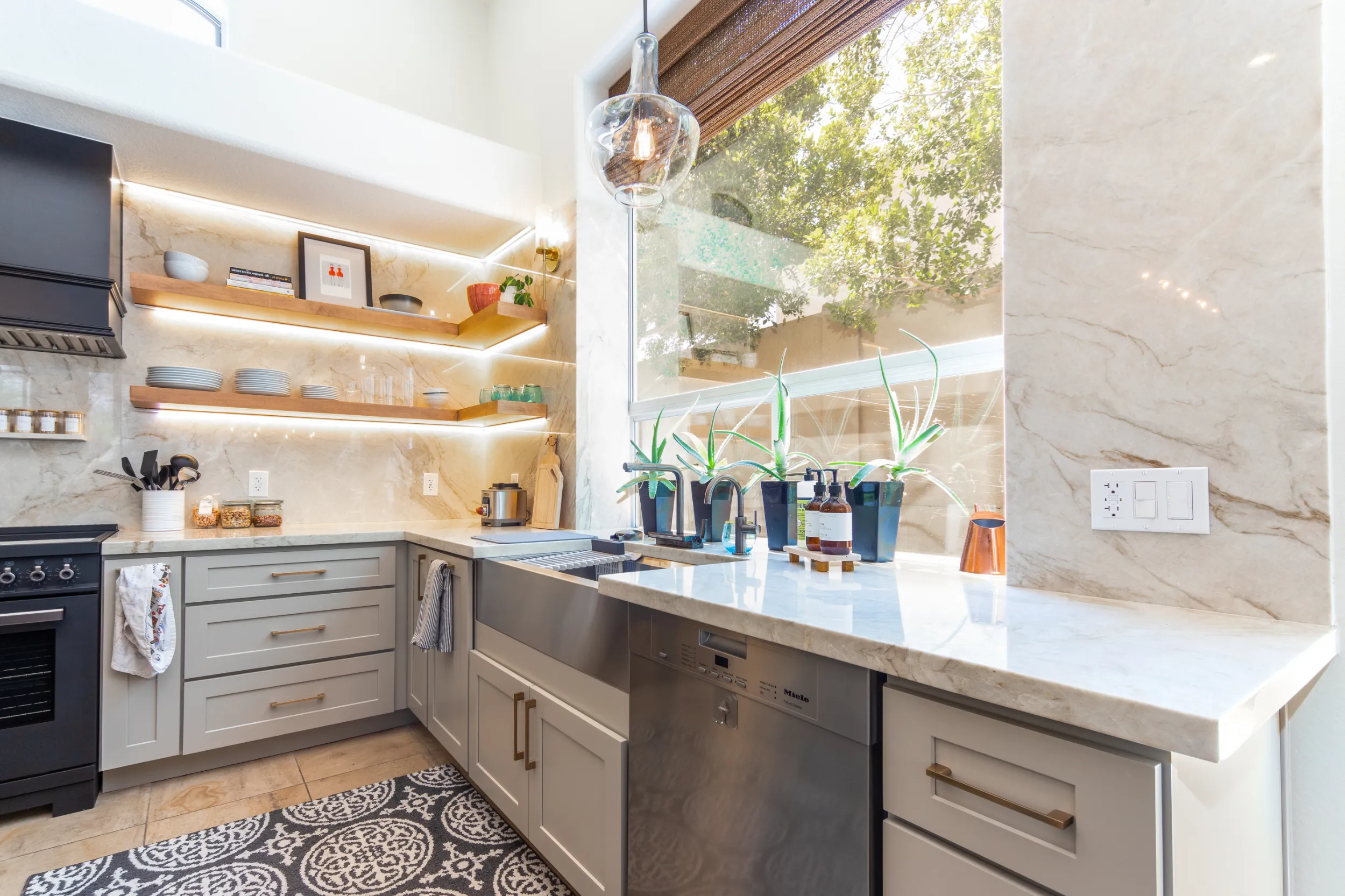 Large kitchen island with integrated cabinets and microwave