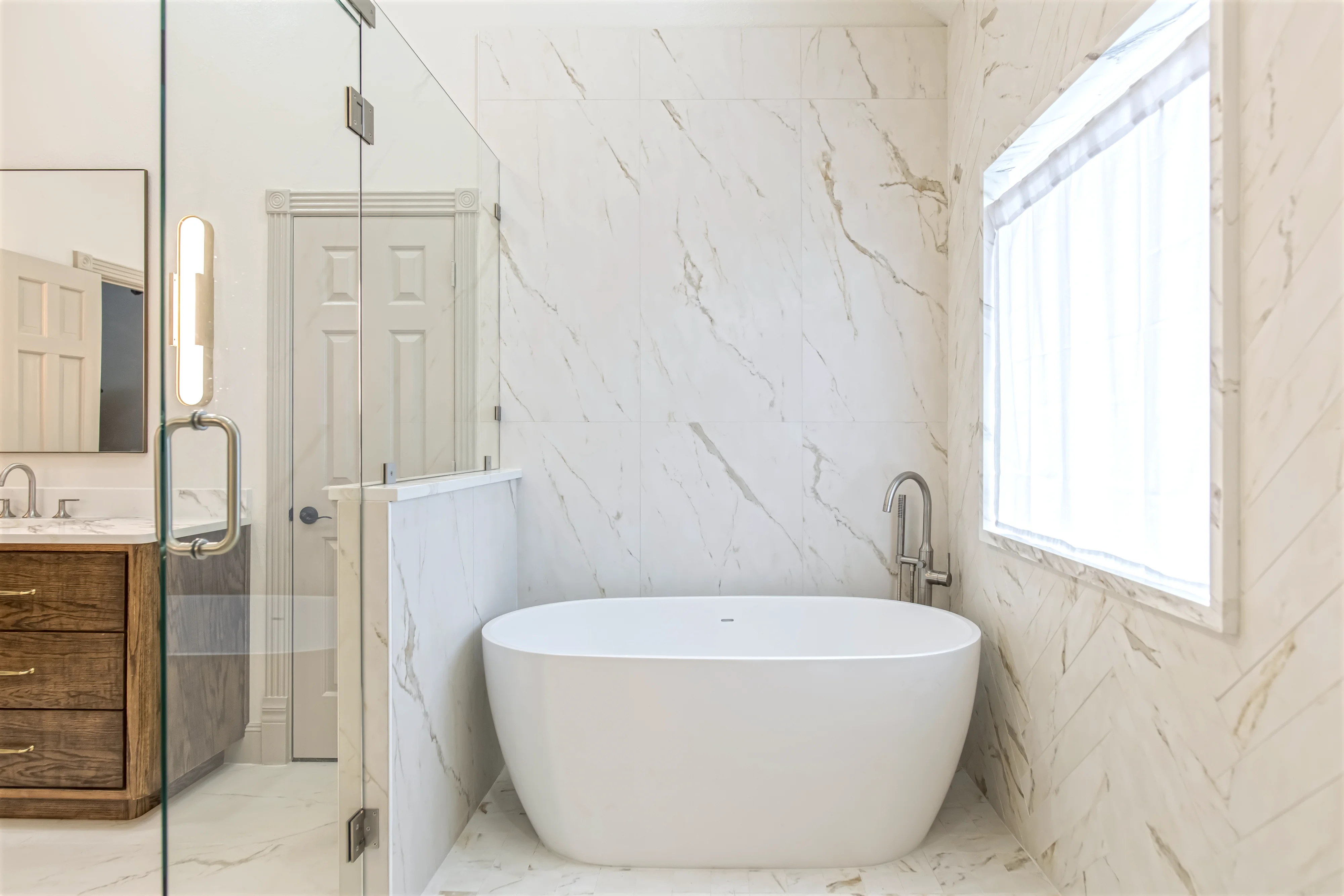 Primary bathroom wetroom with tub